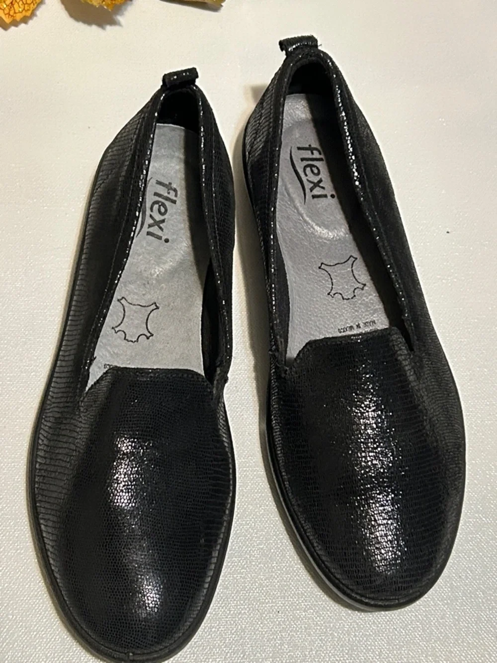 Flexi Black Textured Slip-On Loafers for Women